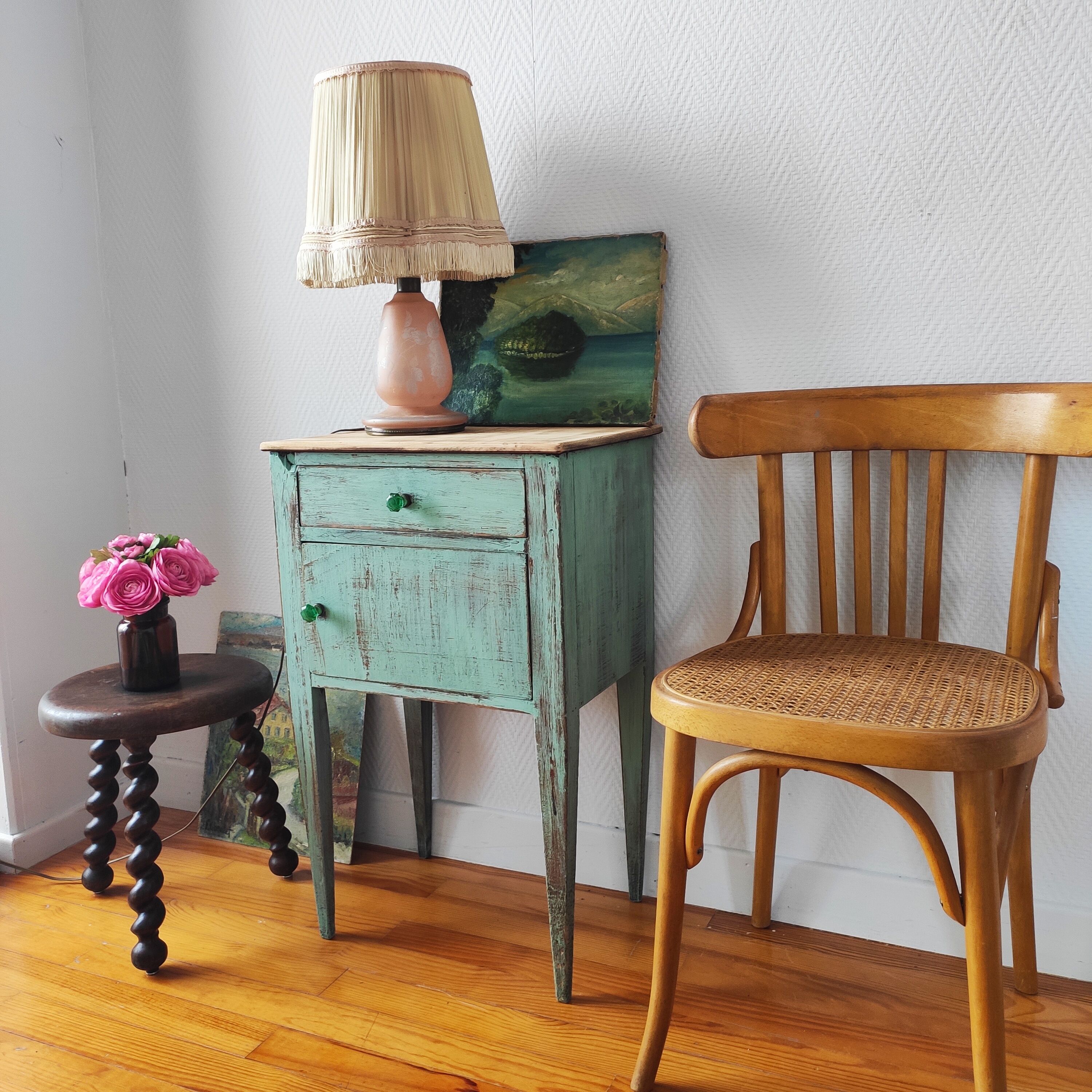 Patinated bedside table end of sofa
