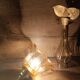 Amber tulip glass portable lamp, golden braided cord.