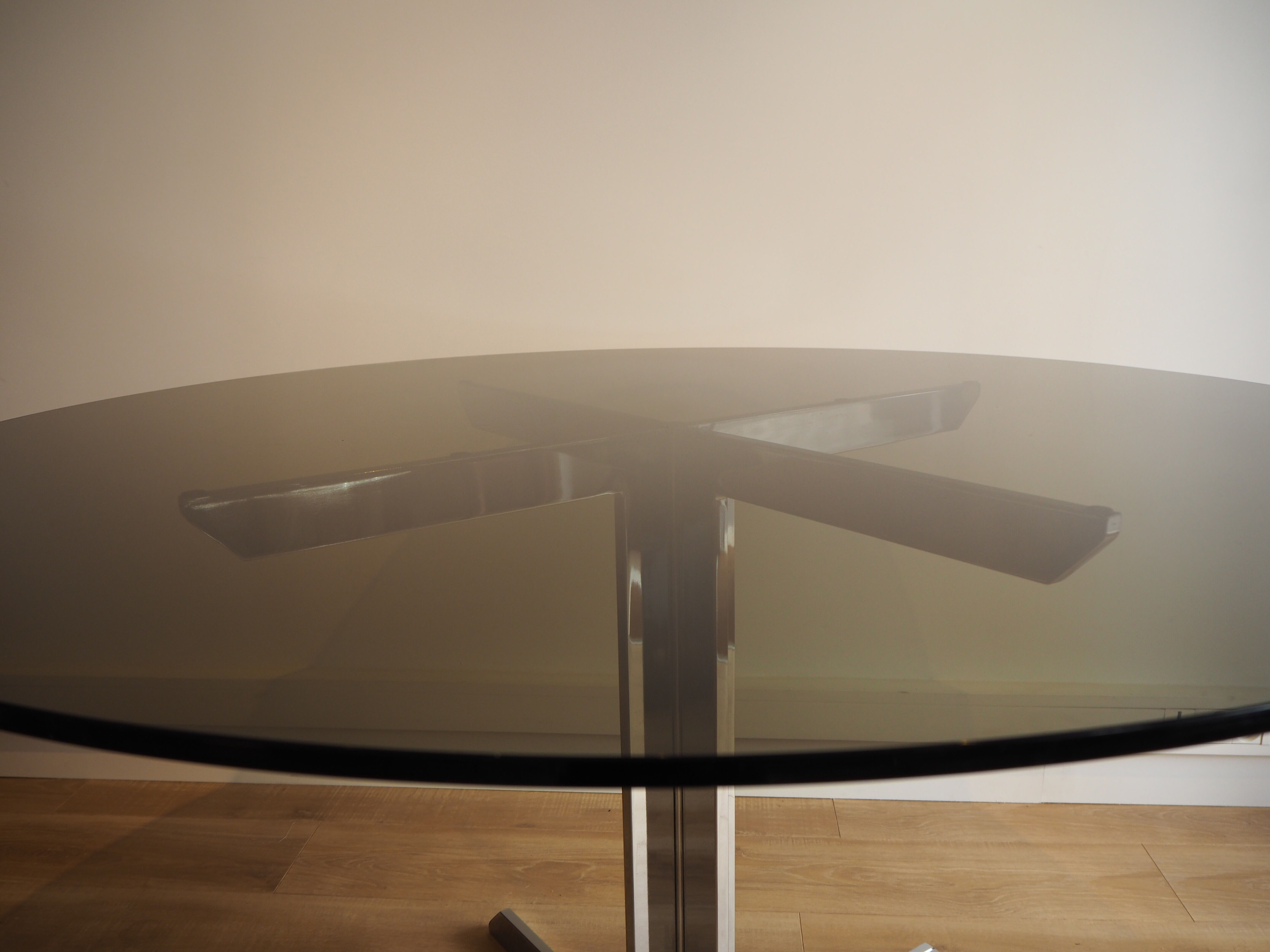 Smoked glass round dining table