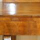 Pair of restored antique consoles from around 1815 in walnut, Regency style with mirror.