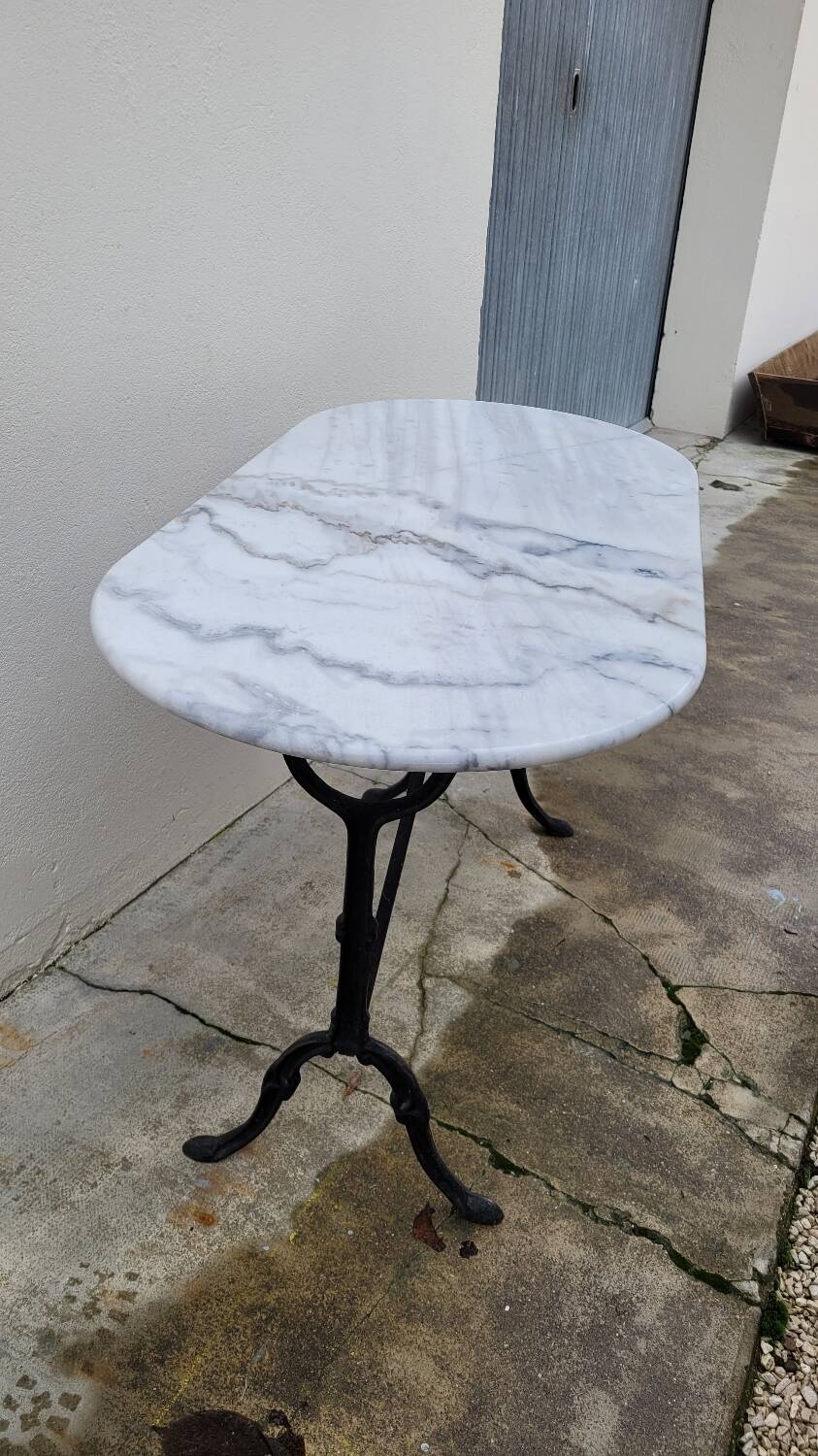 Antique cast iron bistro table with oval marble top