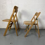 Pair of mismatched wooden folding chairs