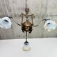 Art Nouveau chandelier with three arms and opalescent iridescent glass.