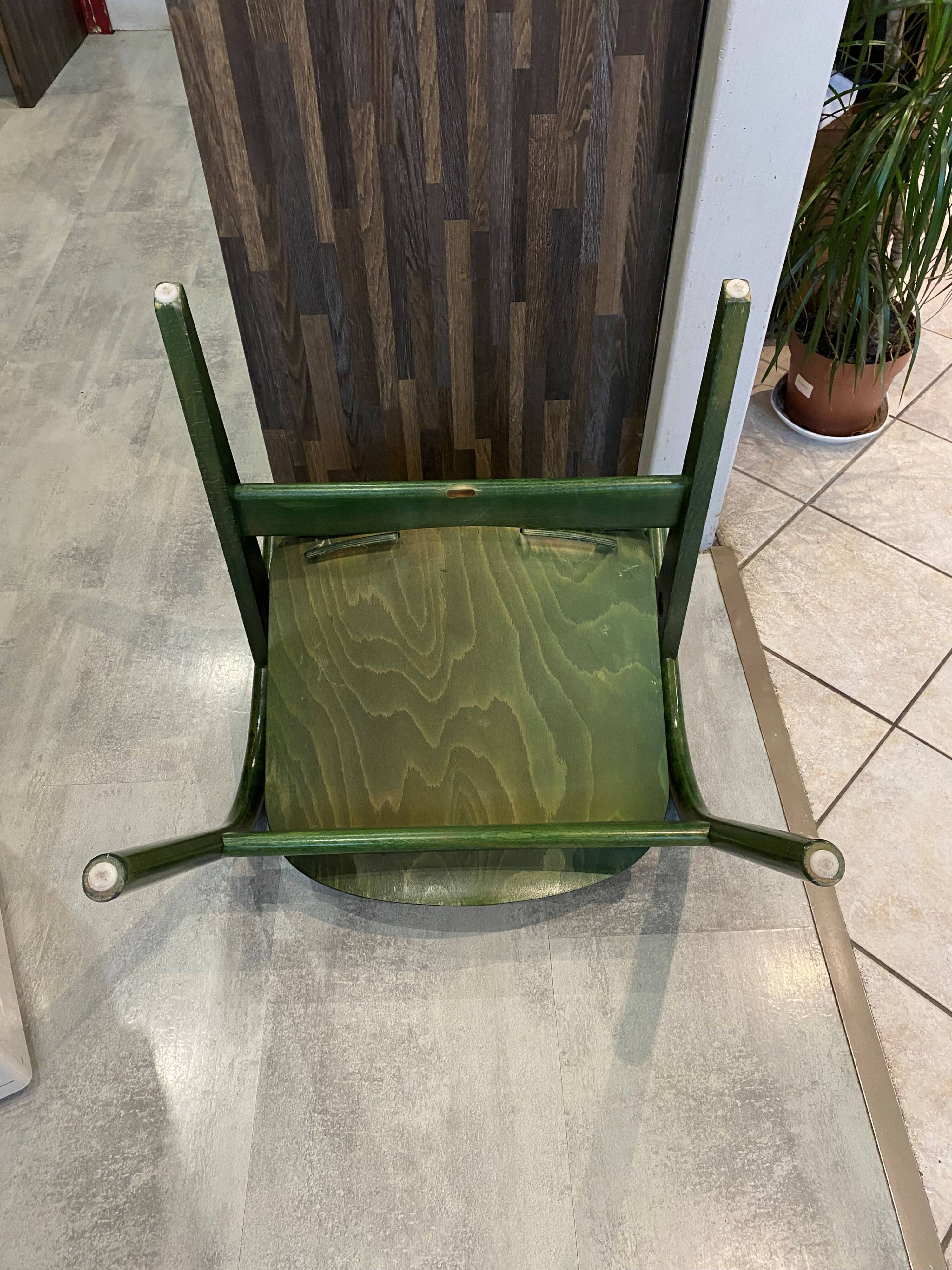Fauteuil Baumann vert, années 70