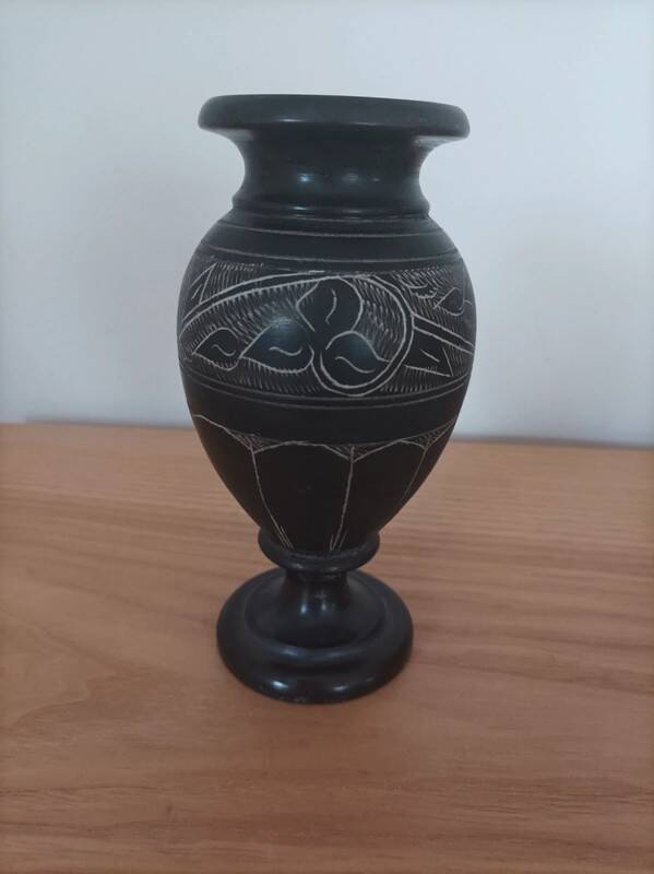 Black vase signed