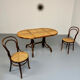 Vintage dining table with a cane top by Mundus from the 1970s.
