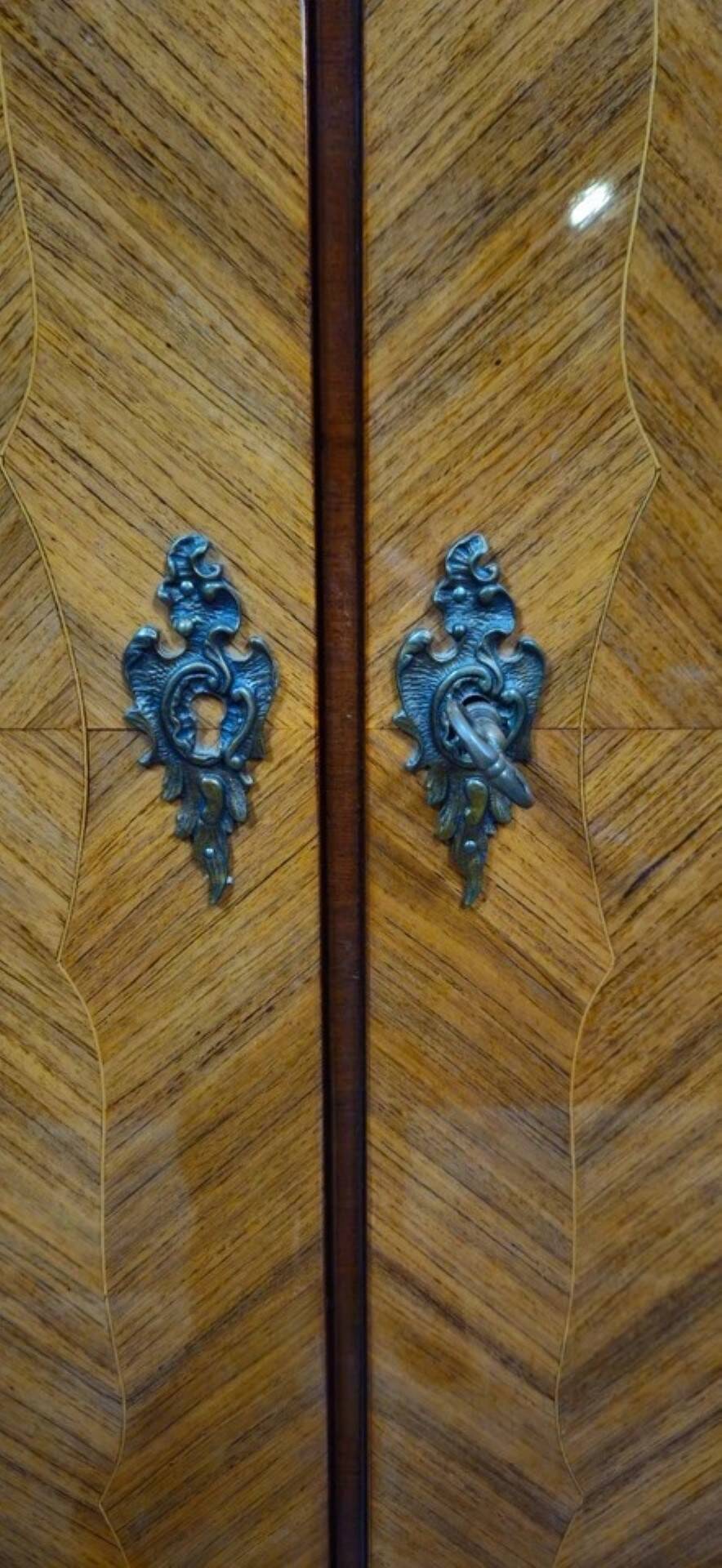 Curved Louis XV style armoire with floral marquetry, 20th century period.
