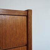 The 1950s oak chest of drawers
