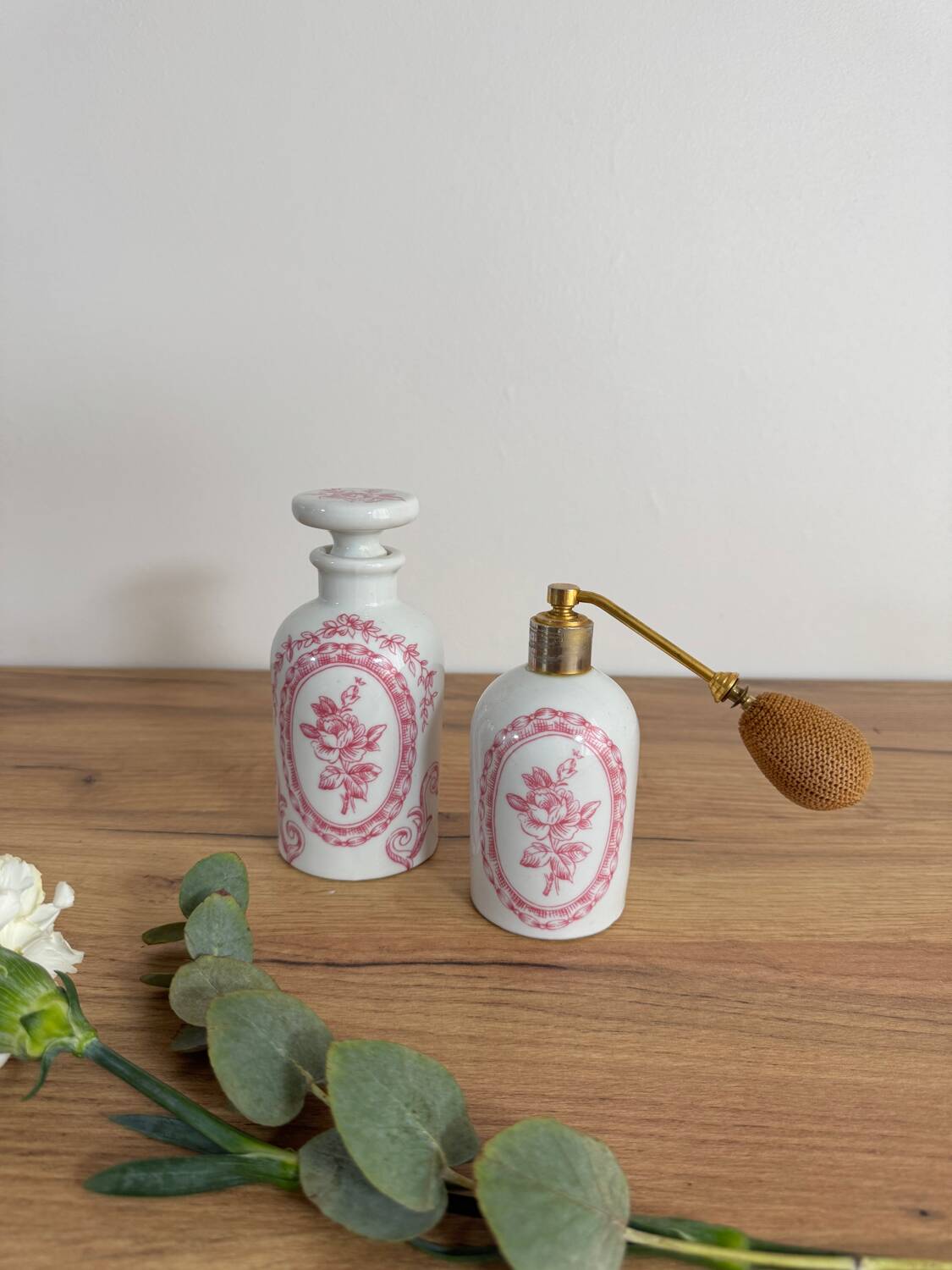 Vintage perfume bottle and spray.