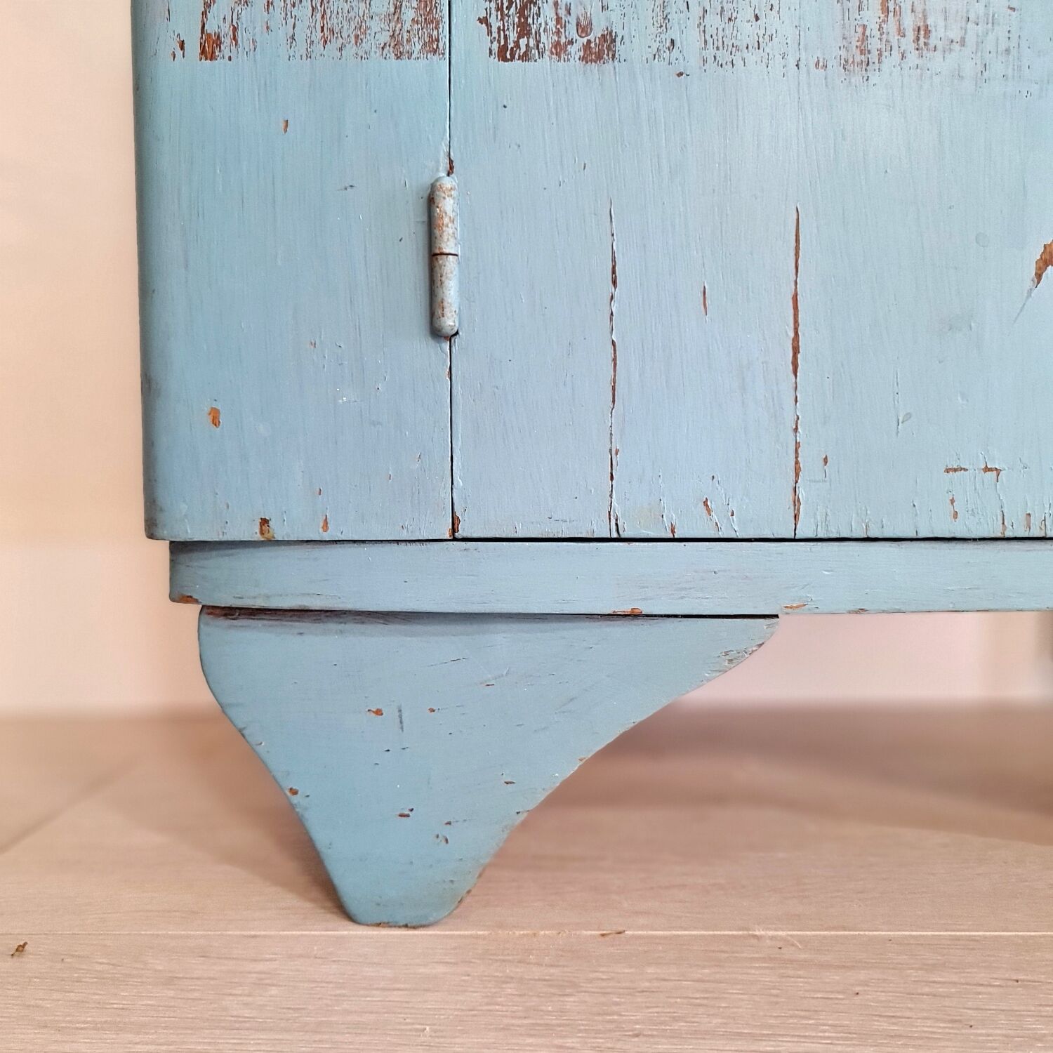 Old blue wood bedside table