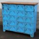 Old blue metal locker with wooden top