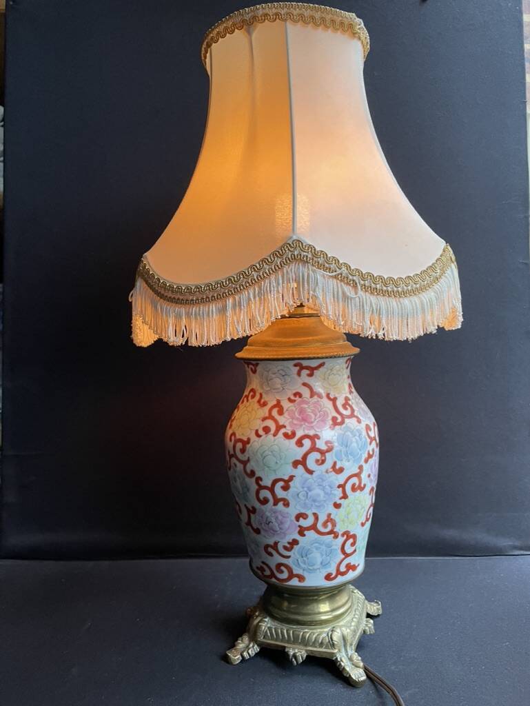 Old Asian vase mounted as a lamp with pagoda lampshade