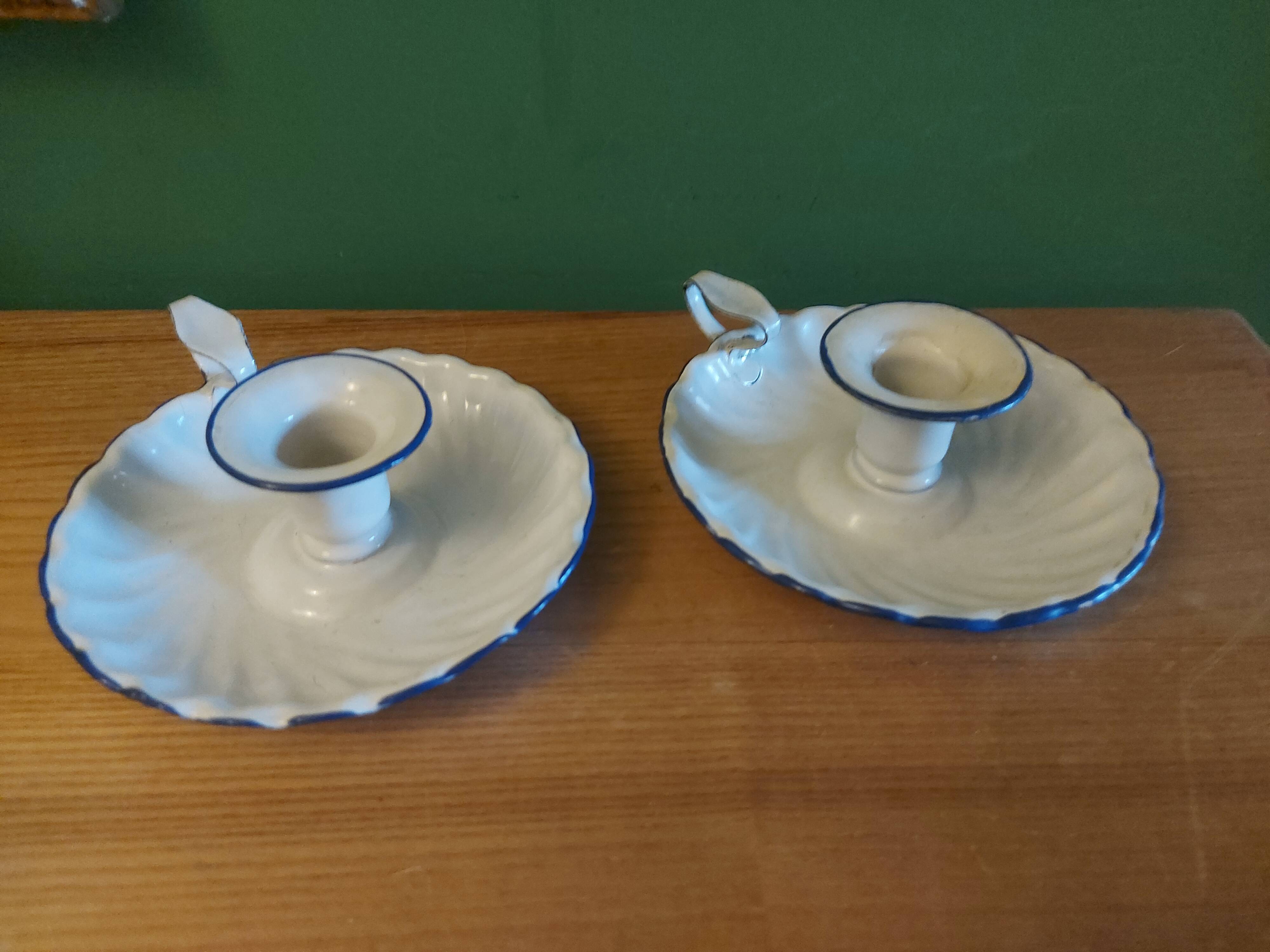Pair of enamelled candle holders