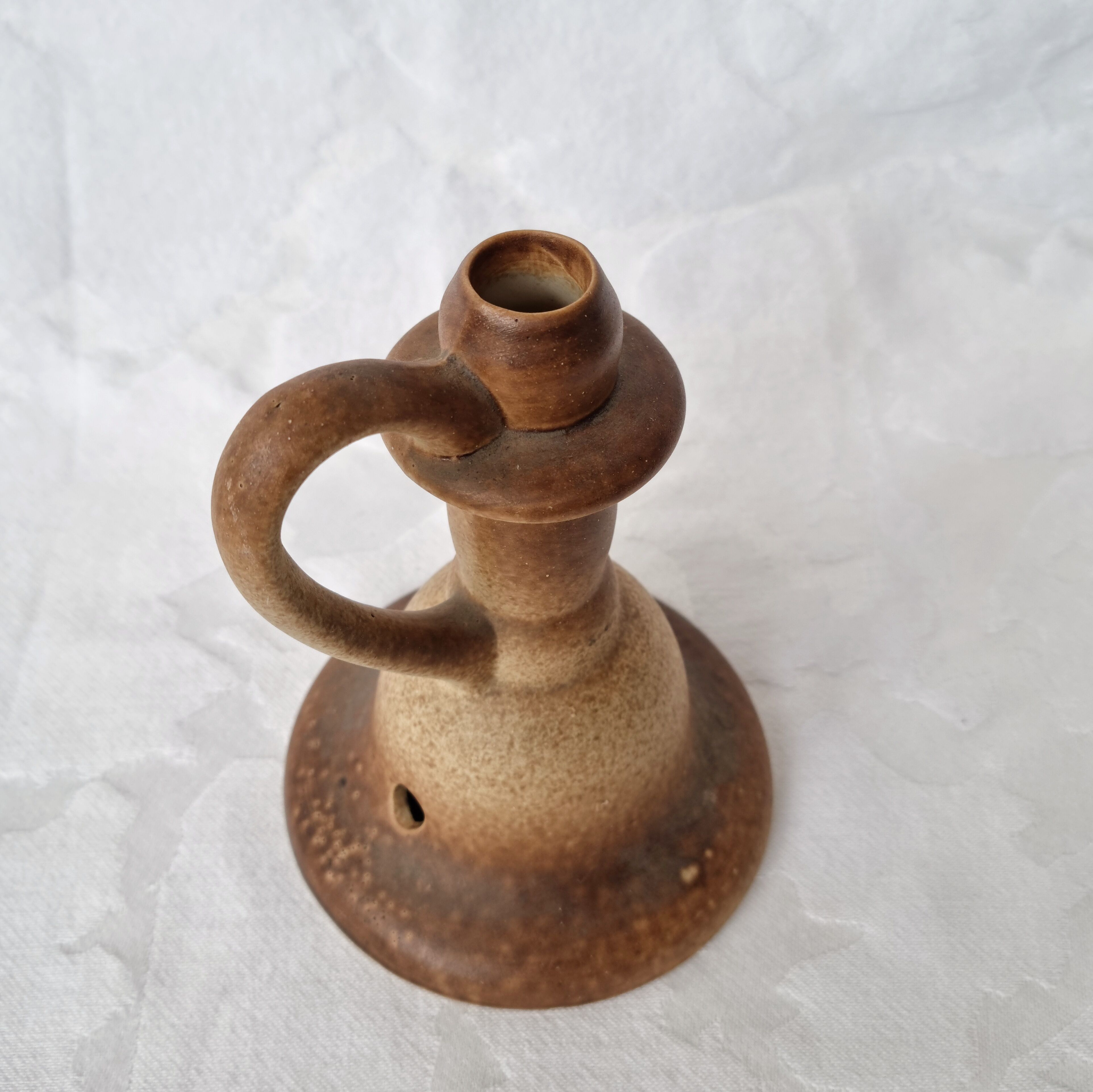 Candle holder or foot of a sandstone lamp
