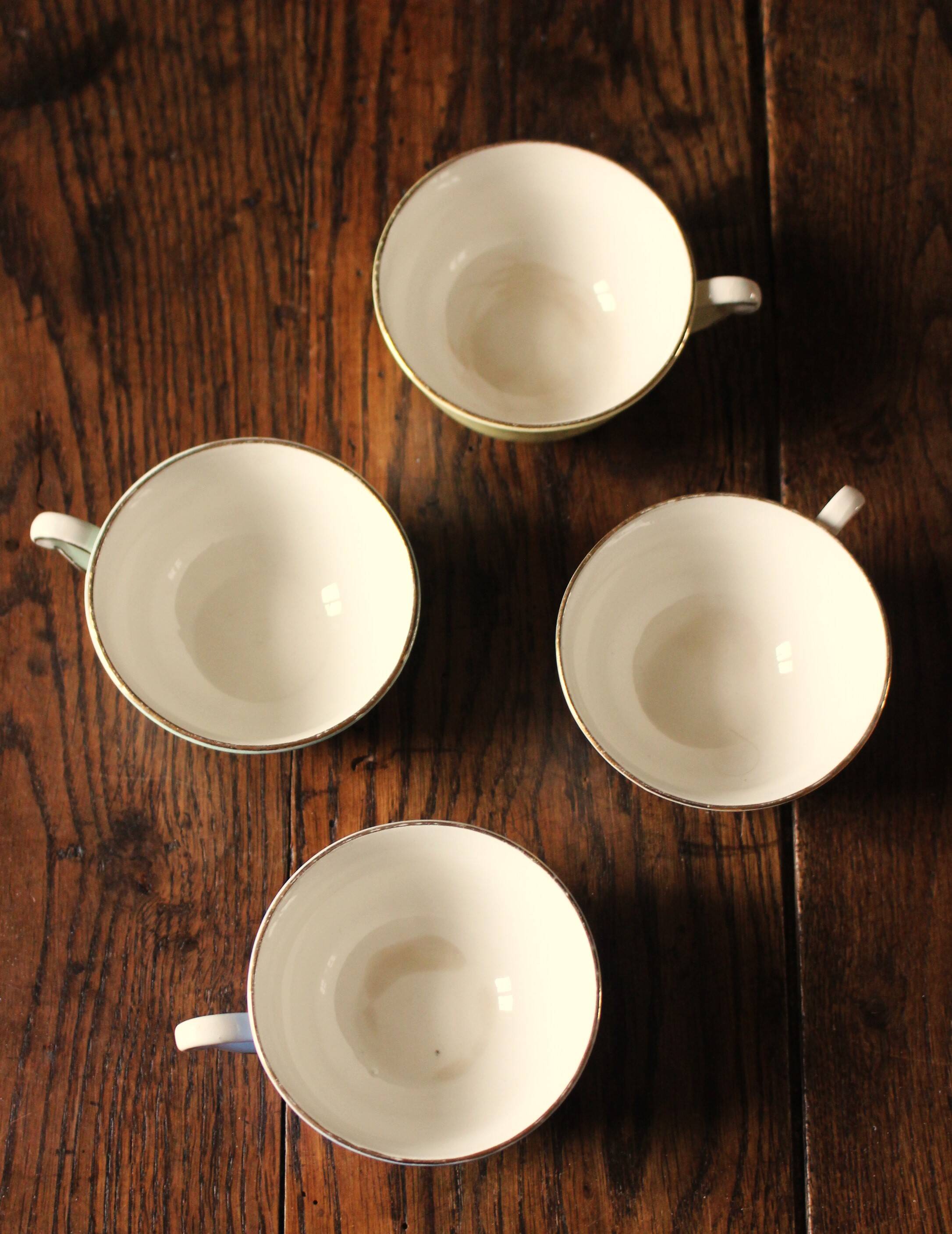 4 Céranord colored and gilded coffee cups