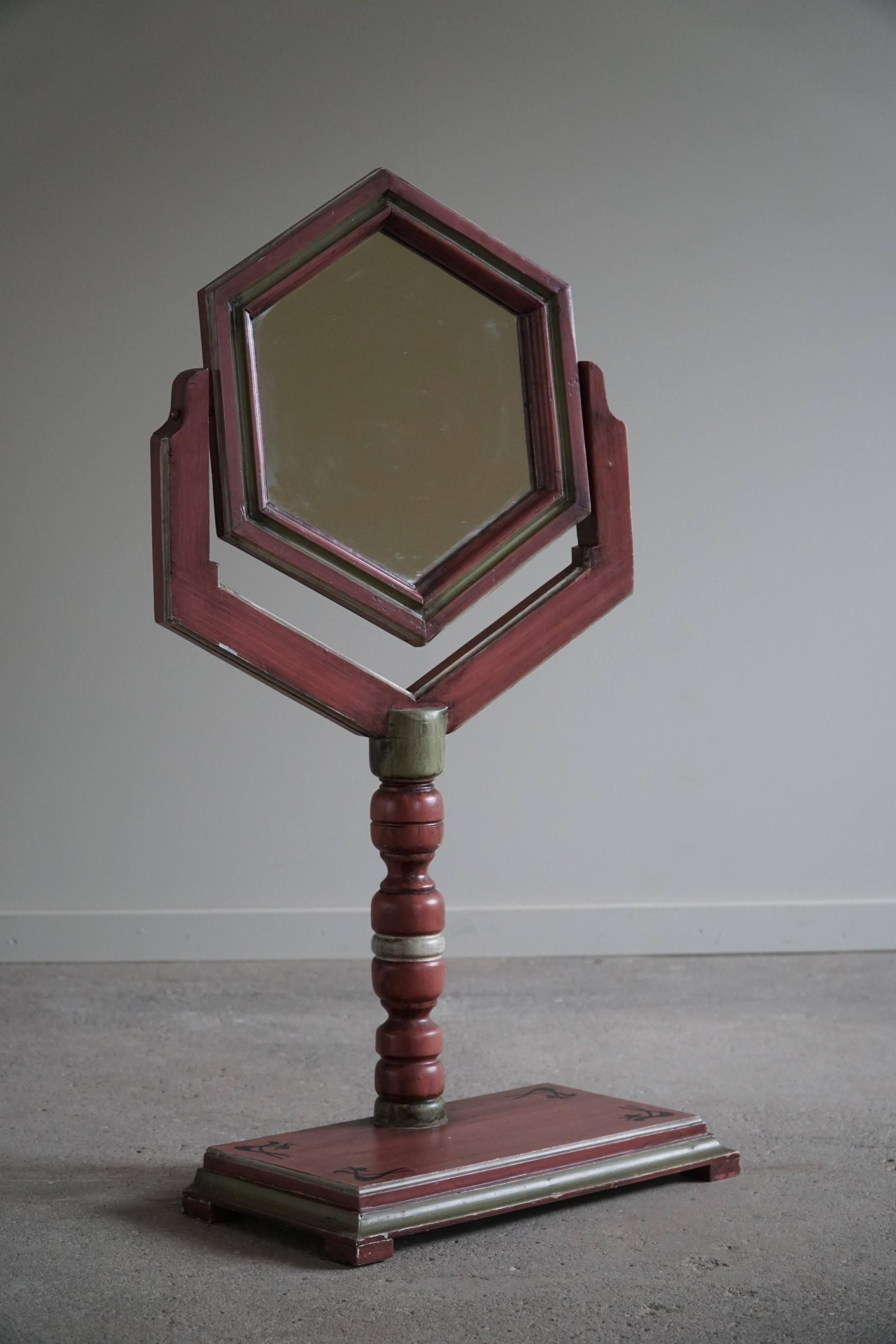 A pine table mirror by a Swedish cabinetmaker, folk art, early 20th century.
