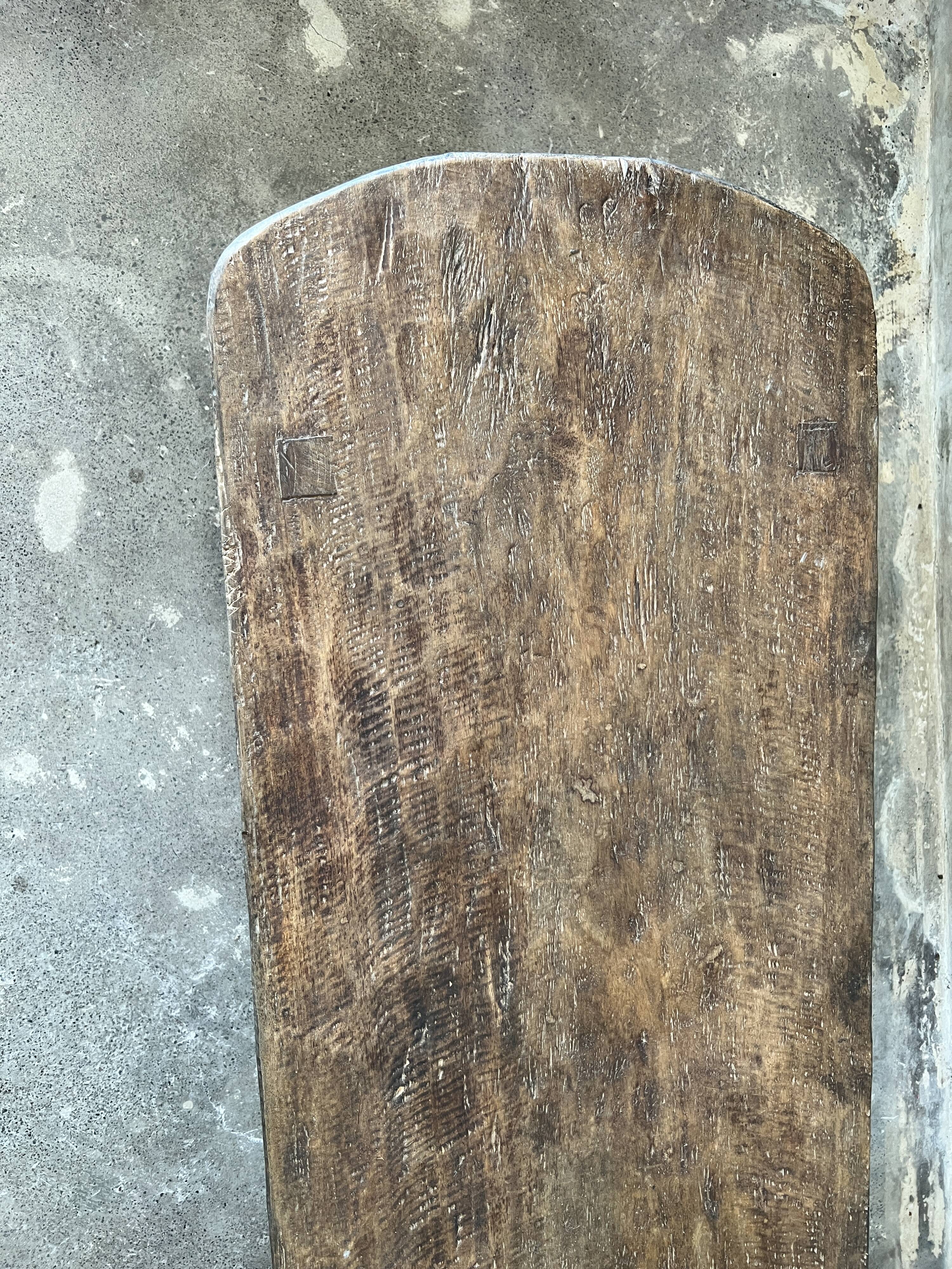 Large rounded coffee table in old Asian teak
