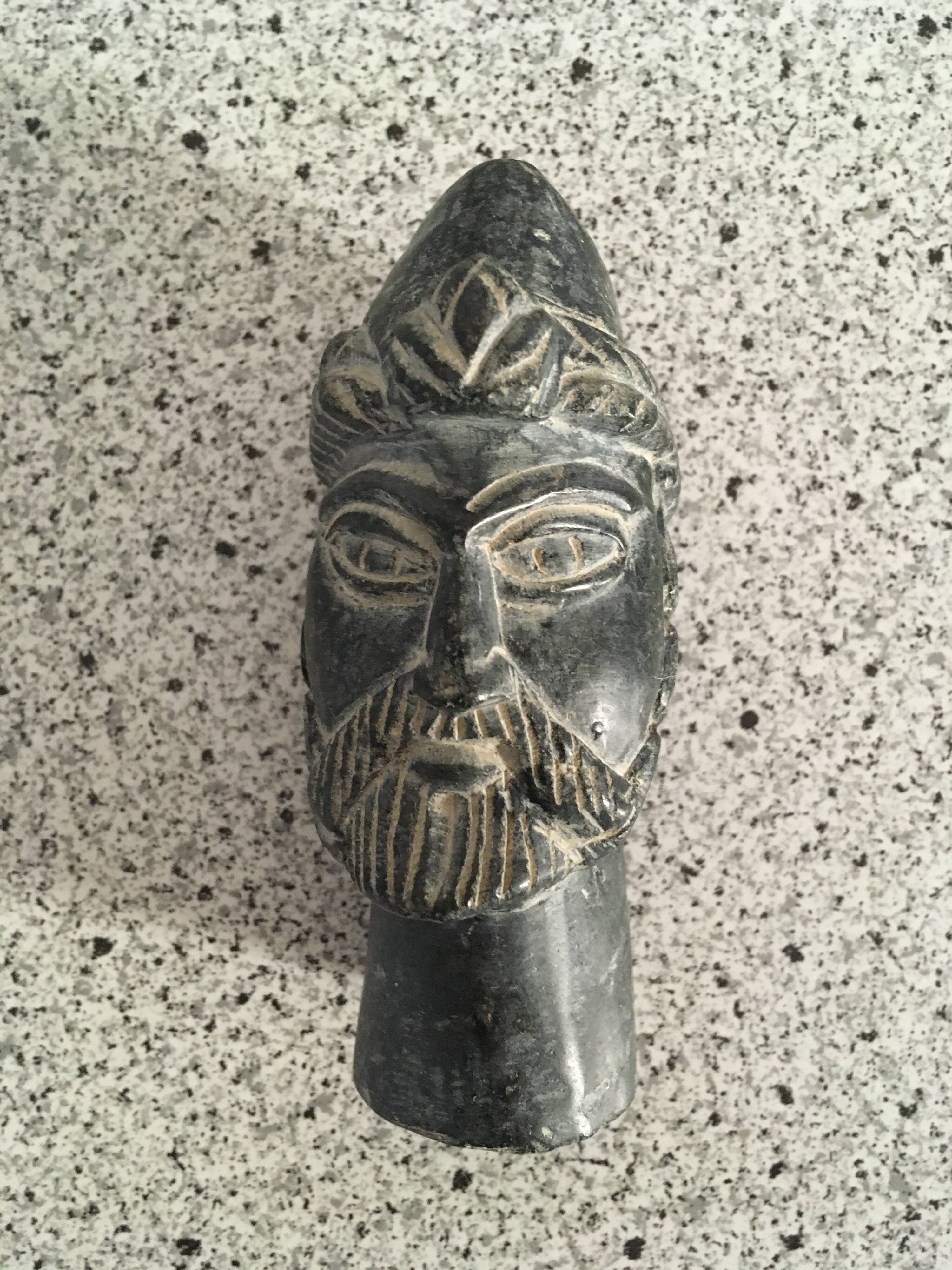 Black marble bust sculpture