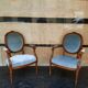 Paire de fauteuils medaillon de style Louis XVI