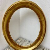 Old oval shaped wooden frame