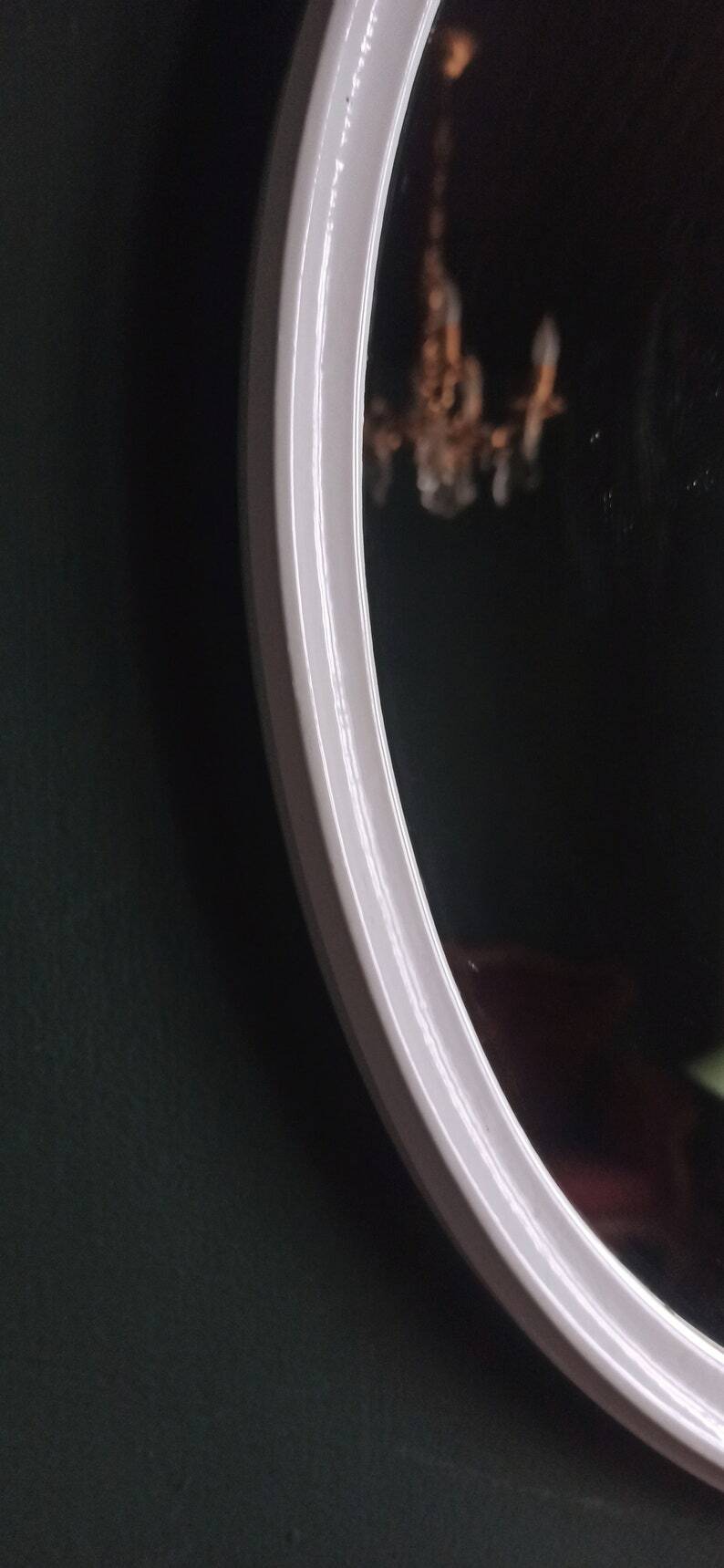 Large oval mirror in vintage white enamelled cast iron