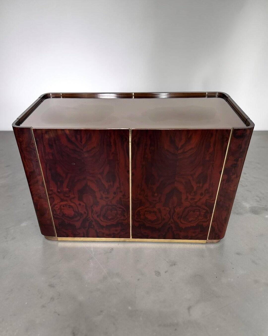 Dry bar in walnut and brass with a mirrored top, Italy 1970.