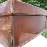 Old monogrammed leather travel suitcase and barony crown