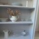 Pearl grey patinated bookcase