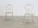 Set of two sculptural French garden chairs