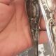 Antique silver metal sugar clamp