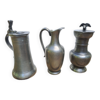 Set of 3 pewter pitchers