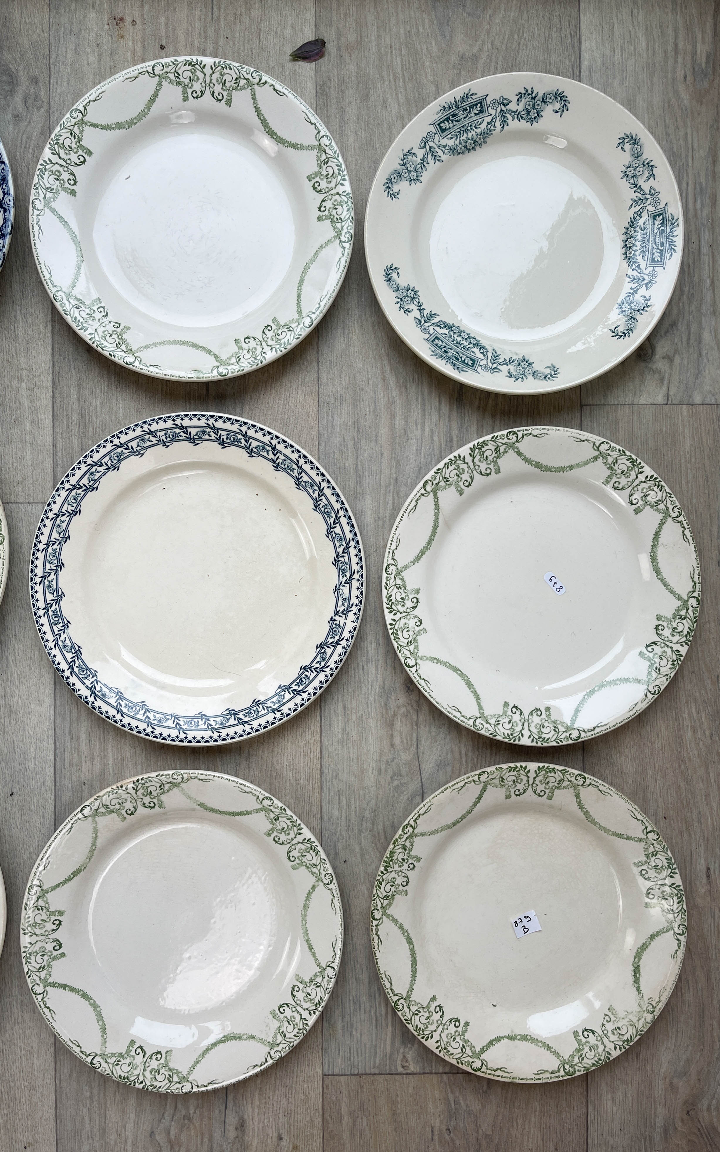 6 green and blue mismatched iron earth plates