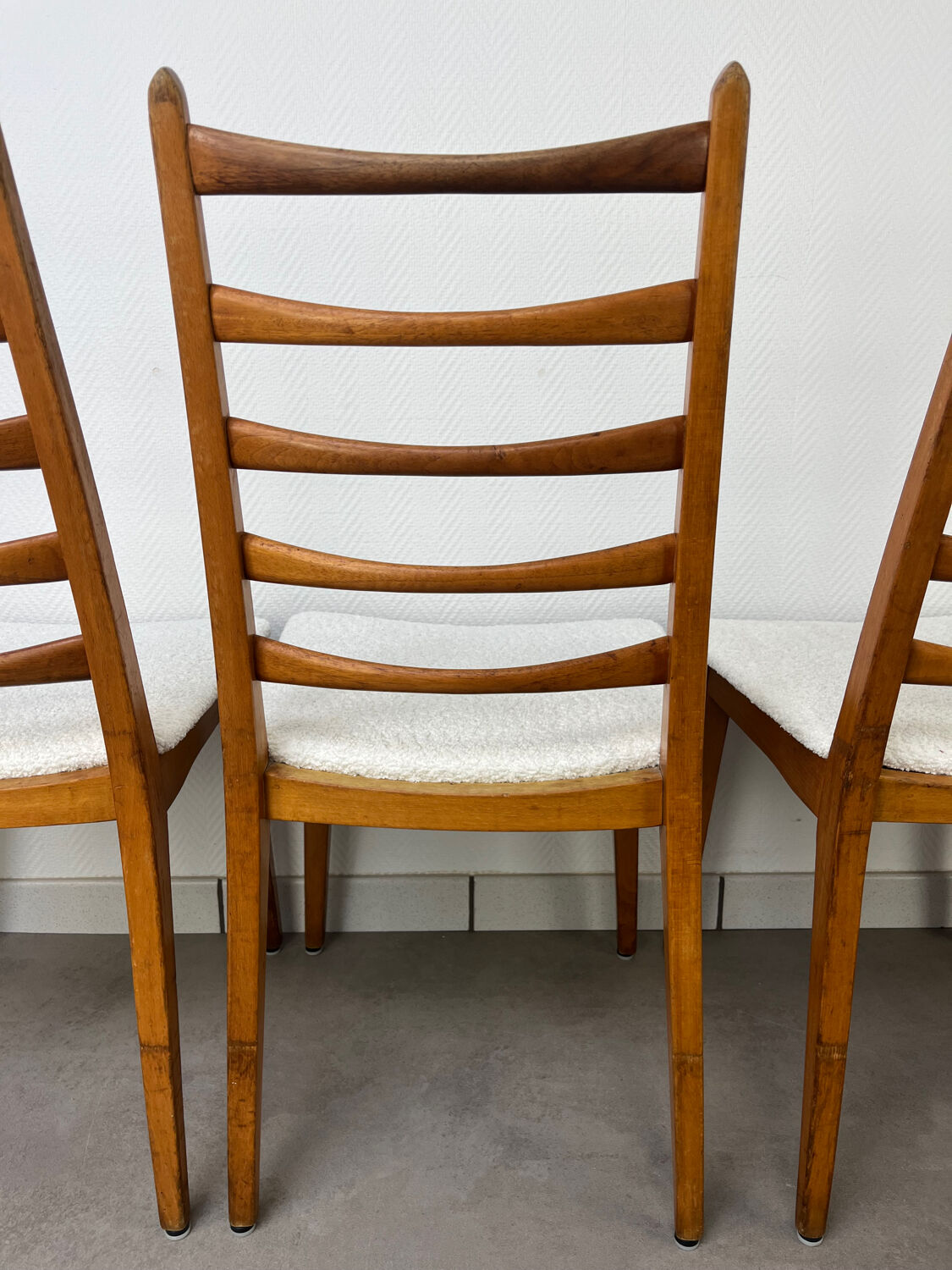 4 Scandinavian chairs, teak with boucle seats.
