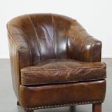 Stylish armchair made of cowhide leather with a unique design and beautiful finish
