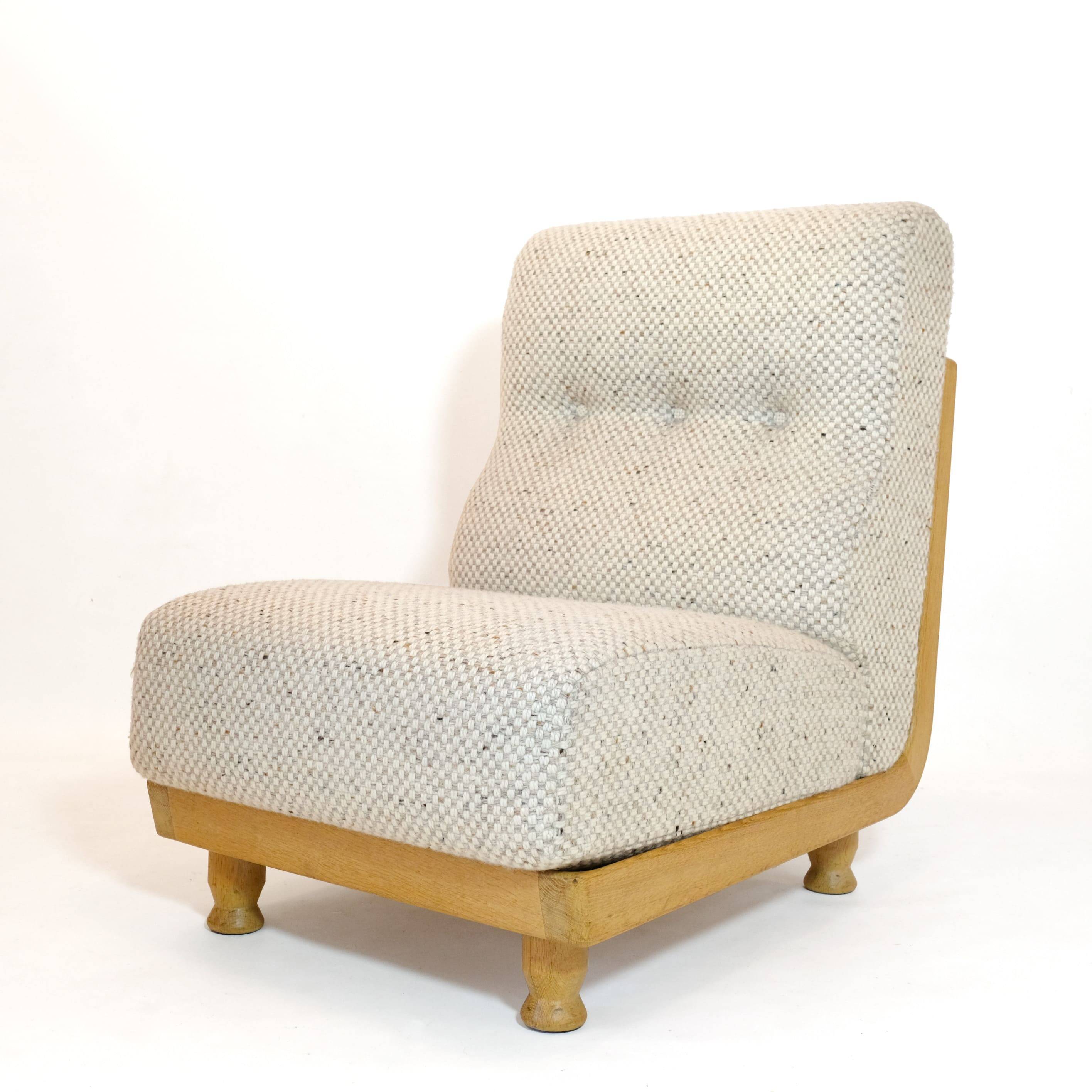 Robert Guillerme & Jacques Chambron, armchair upholstered in beige fabric.