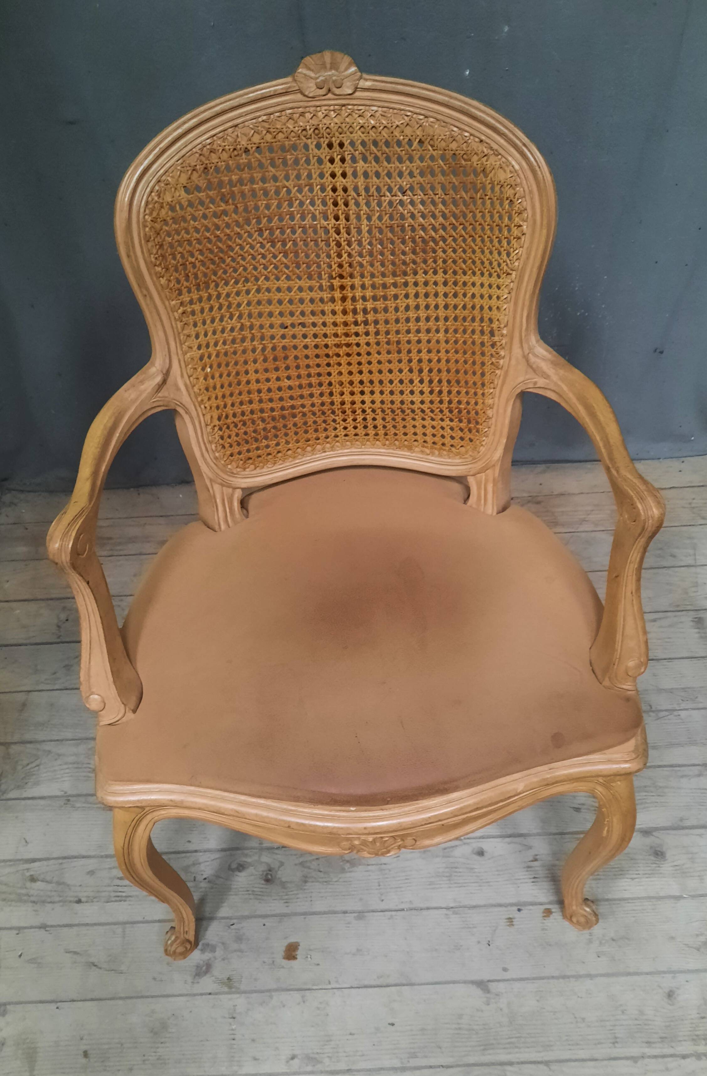 Louis XVI style caned armchair