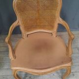 Louis XVI style caned armchair