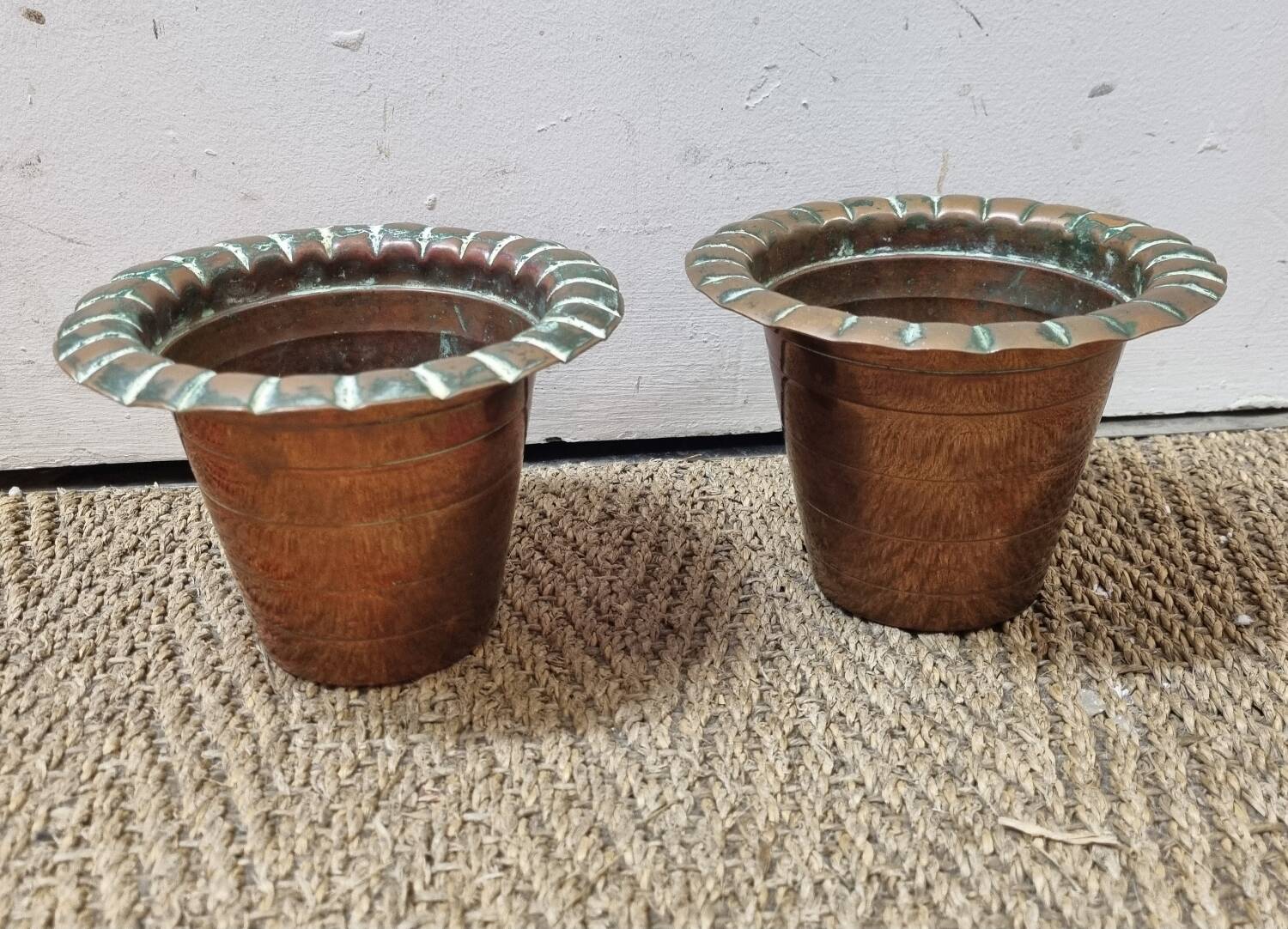 2 copper pot covers, 1960