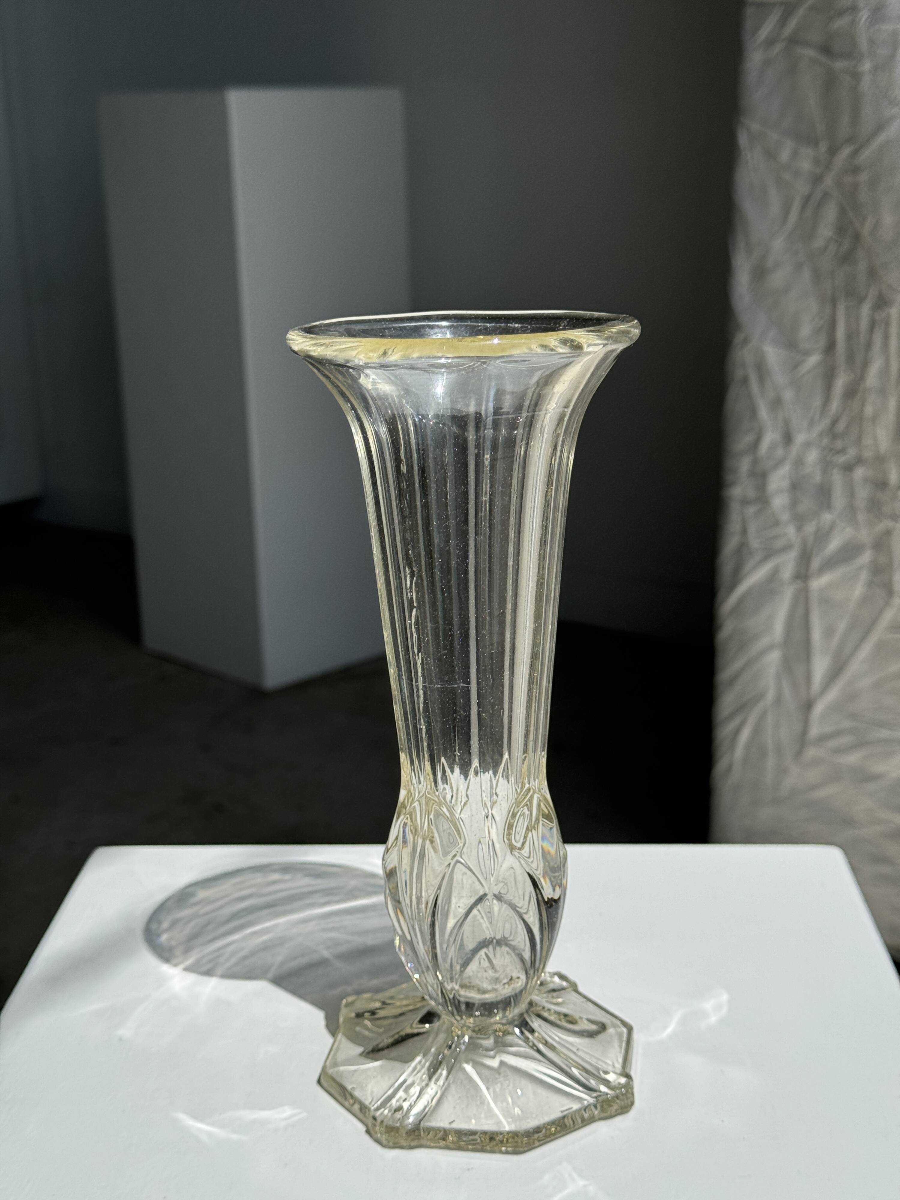 Art deco style flared neck pedestal vase in blown glass