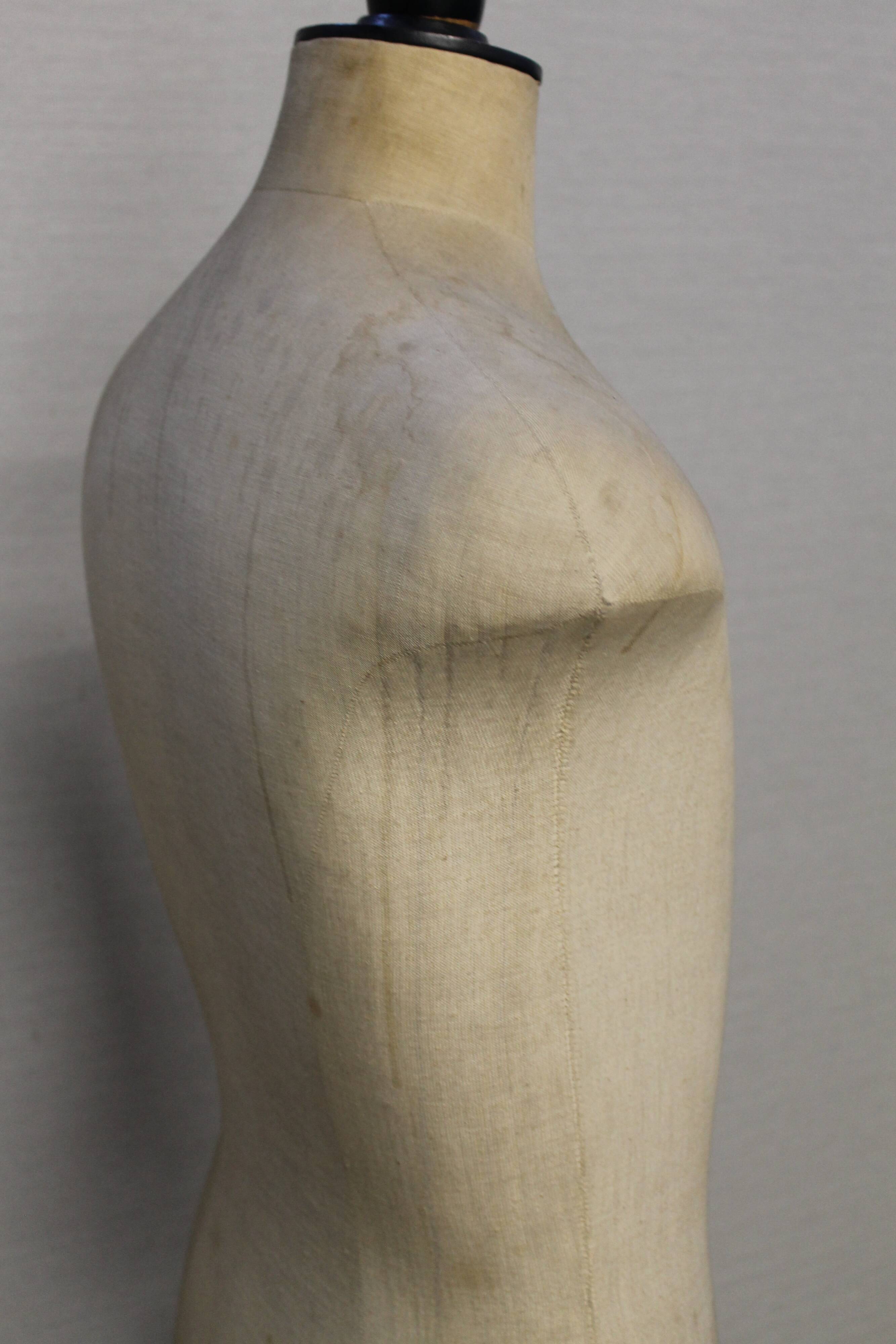 Man sewing mannequin