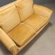 Two-seater velvet sofa from the 1950s to be restored.