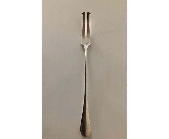 Silver metal condiment fork