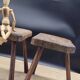 Pair of solid octagon cowhide tripod stools