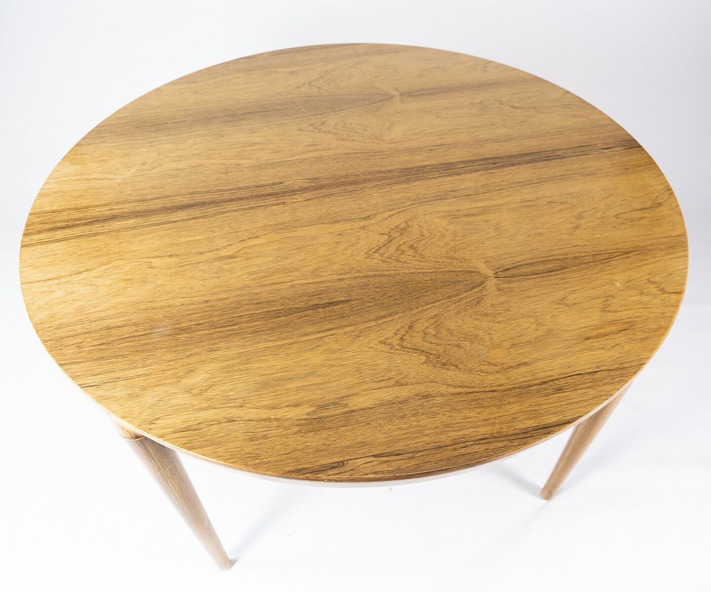 Dining table in rosewood of danish design from the 1960s.