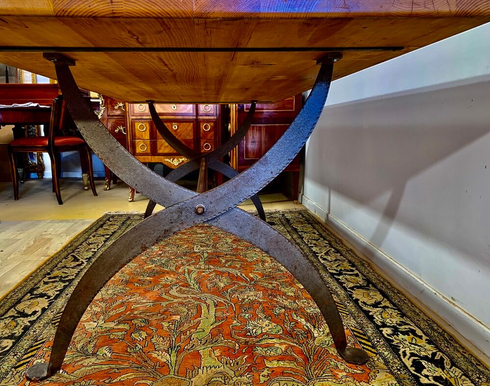 Rectangular wooden table, legs and spacer in hammered ironwork, 60s