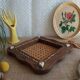 Dessous de plat bois et cannage vintage