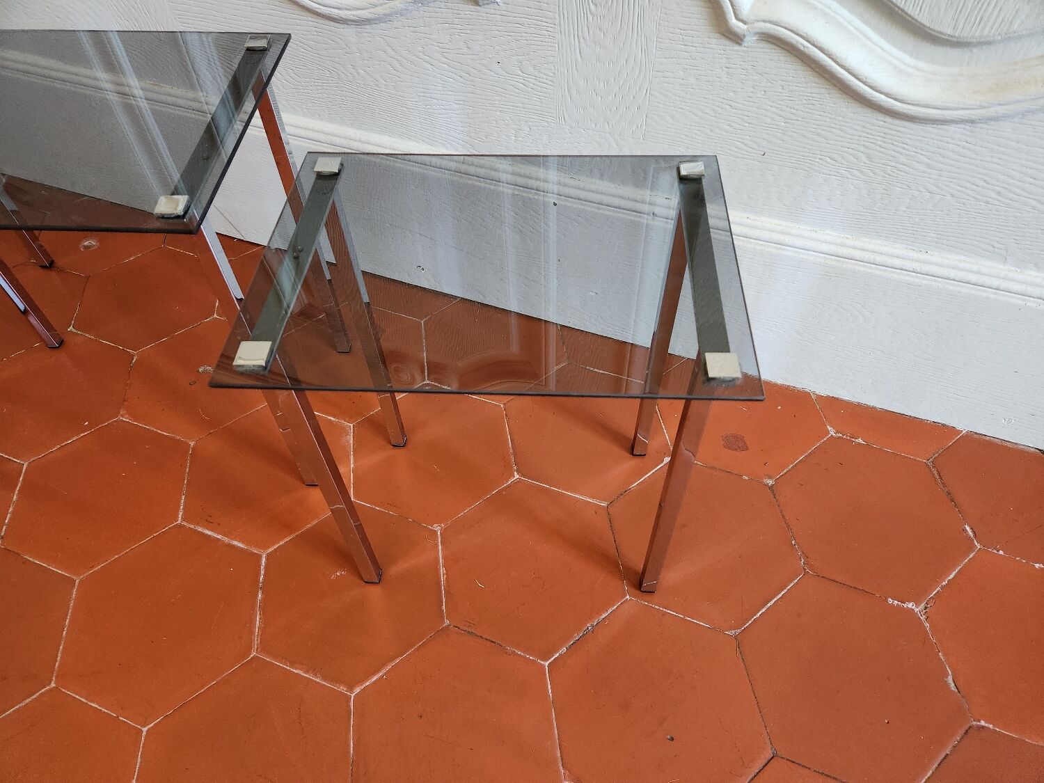 3 nesting tables from the 1970s in smoked glass.