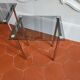 3 nesting tables from the 1970s in smoked glass.