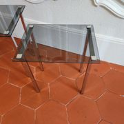 3 nesting tables from the 1970s in smoked glass.