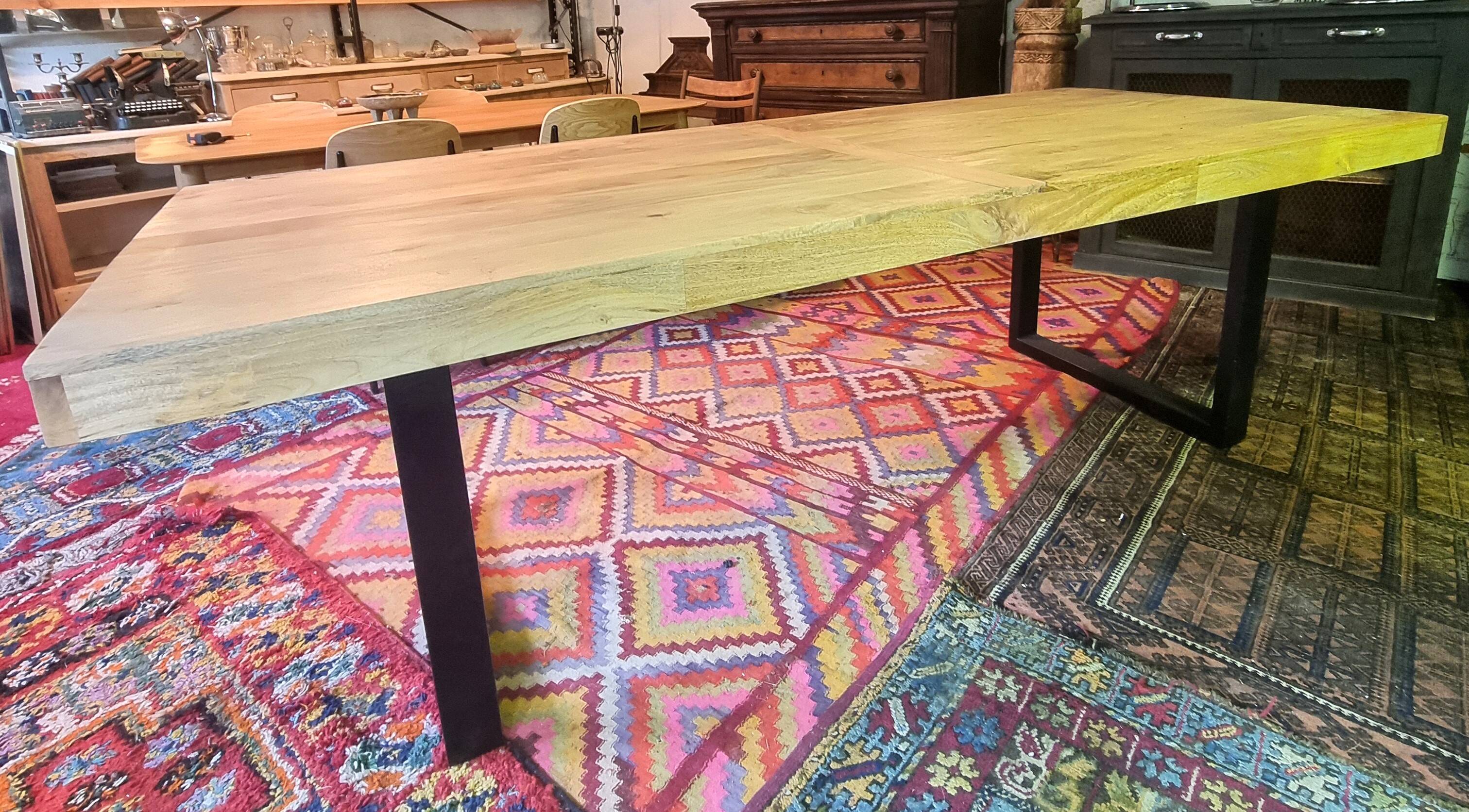 Large mango wood table with contemporary base